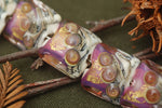 10108904 - Seven Cranberry Treasure Pillow Beads