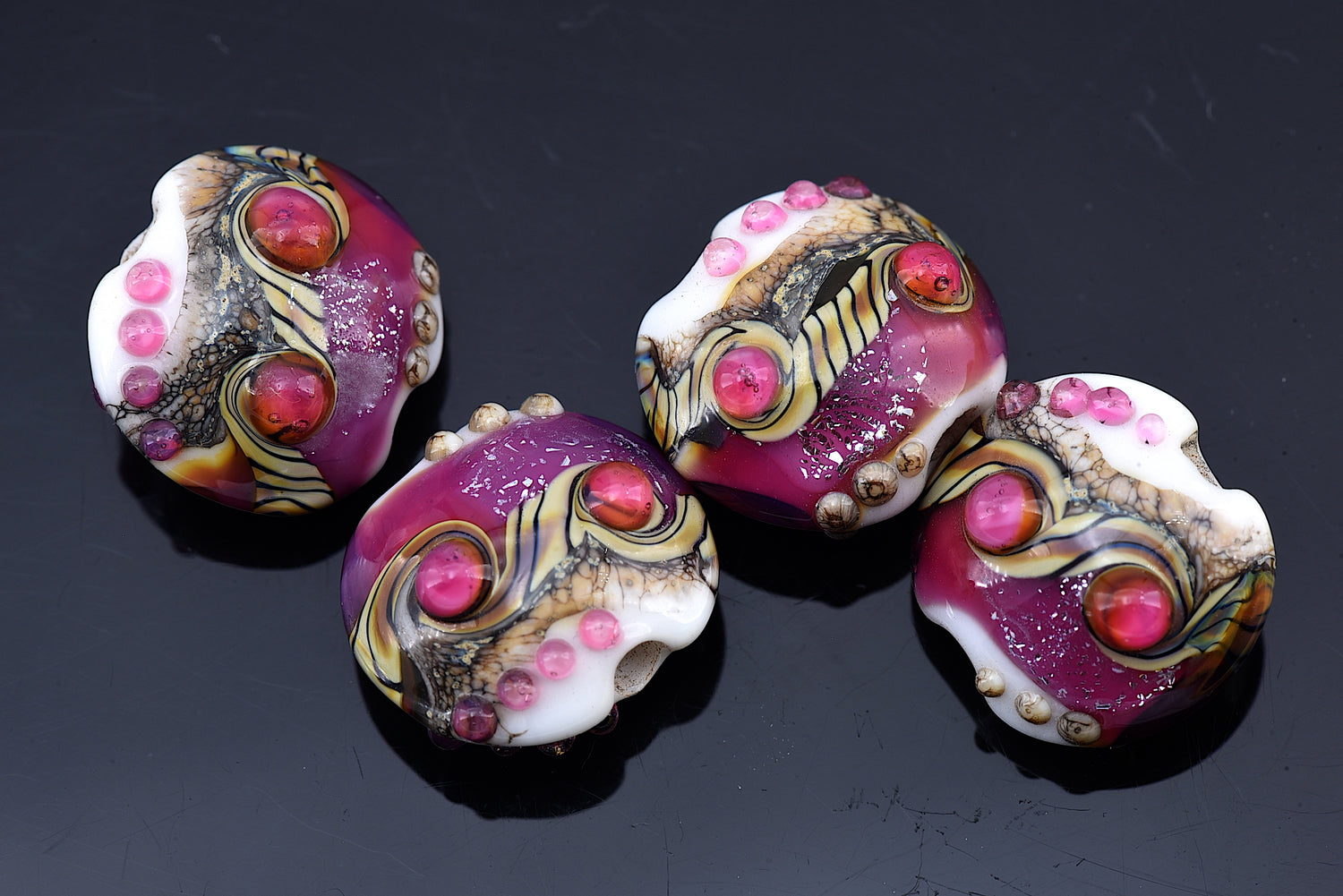 10109012 - Four Cranberry Stardust Lentil Beads