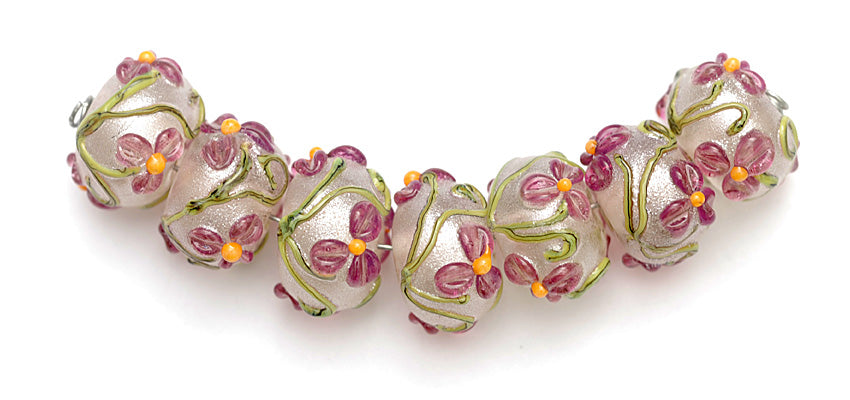 10109301 - Seven Fuchsia Flower Rondelle Beads