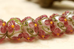 10109301 - Seven Fuchsia Flower Rondelle Beads