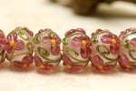 10109301 - Seven Fuchsia Flower Rondelle Beads