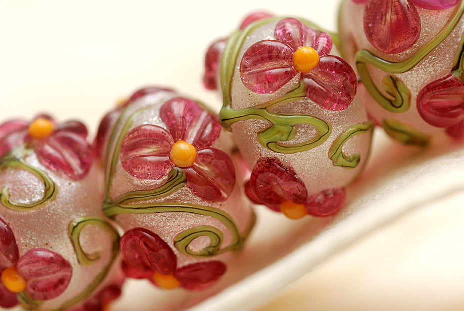 10109301 - Seven Fuchsia Flower Rondelle Beads