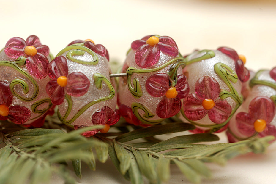 10109301 - Seven Fuchsia Flower Rondelle Beads