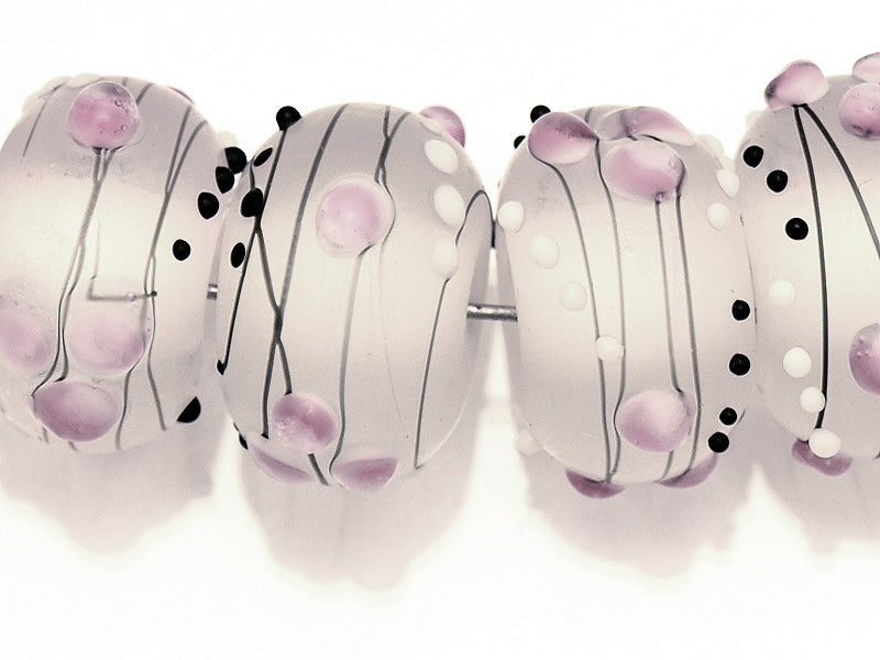 10109641-Eight Champagne Party Rondelle Lampwork Beads