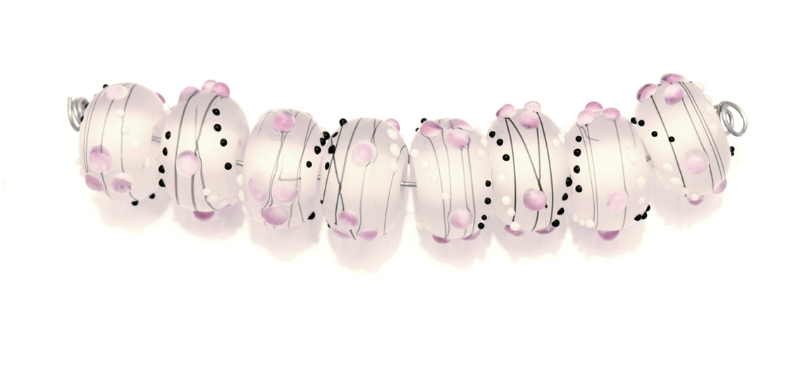10109641-Eight Champagne Party Rondelle Lampwork Beads
