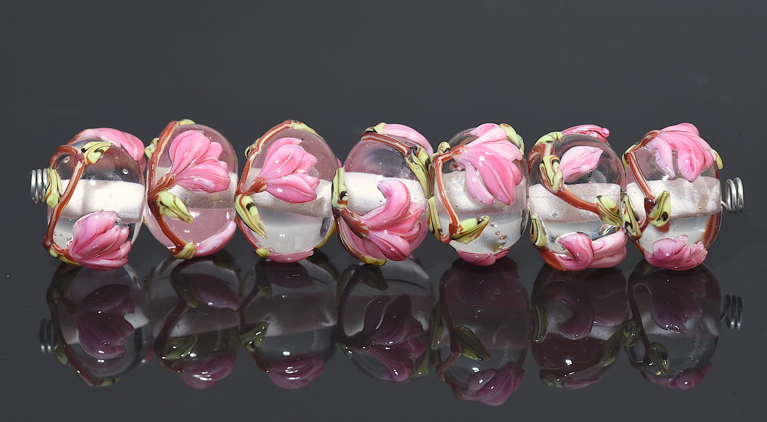 10110601 - Seven Blushing Magnolia Rondelle Beads