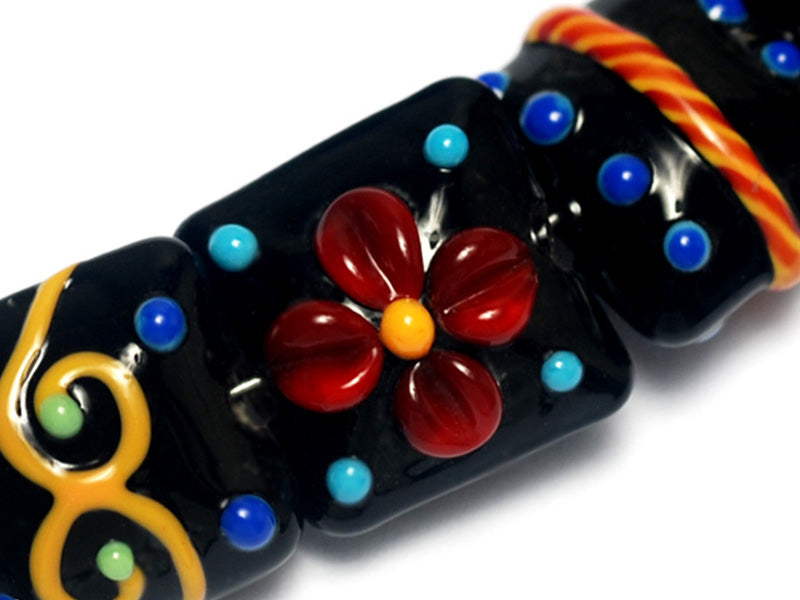10201204 - Seven Black Based Fiesta Lentil Beads