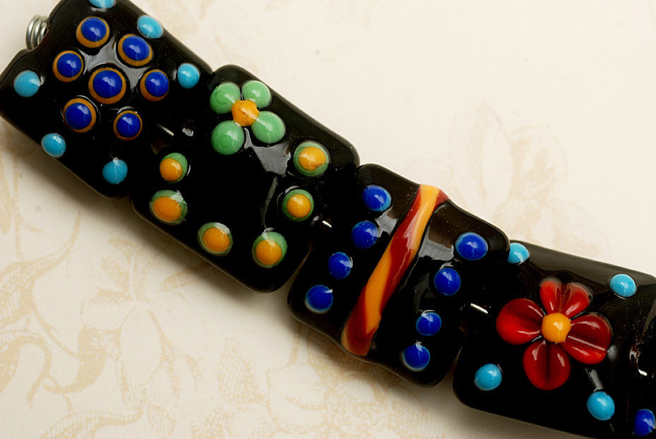 10201204 - Seven Black Based Fiesta Lentil Beads