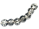 10202302 - Seven Black & White Lentil Beads