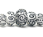 10202311 - Five Graduated Black & White Rondelle Beads