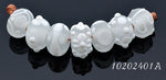 10204001 - Seven Matte Finish White Rondelle Beads