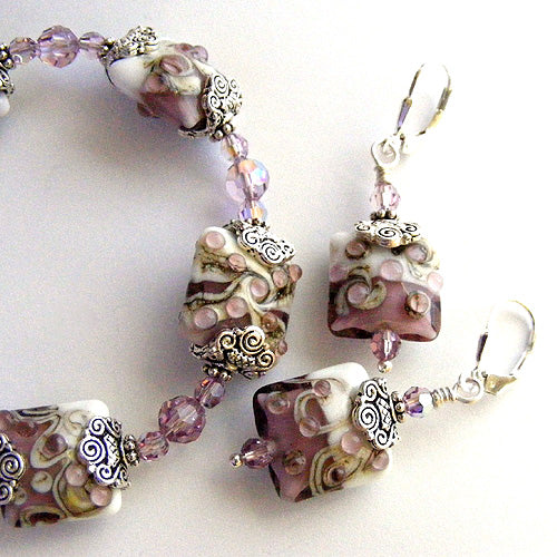 10203104 Bracelet and Earrings using Amethyst/White Pillow Beads