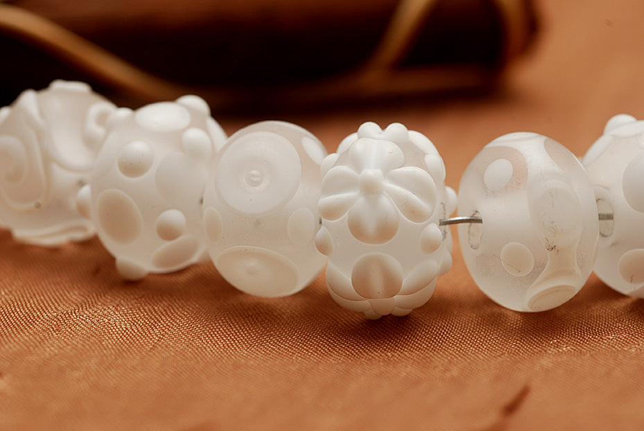 10204001 - Seven Matte Finish White Rondelle Beads