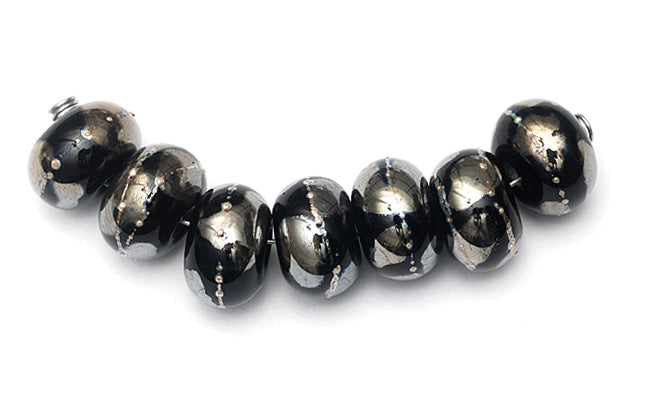 10204101 - Seven Elegant Black Metallic Rondelle Beads