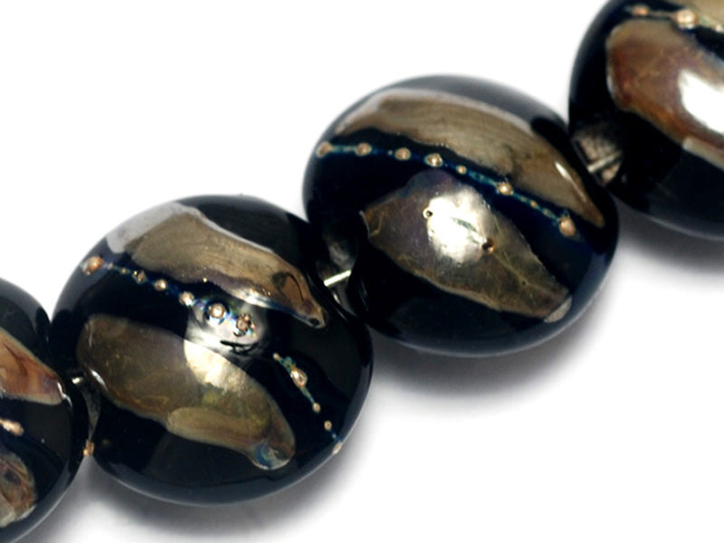 10204102 - Seven Elegant Black Metallic Lentil Beads