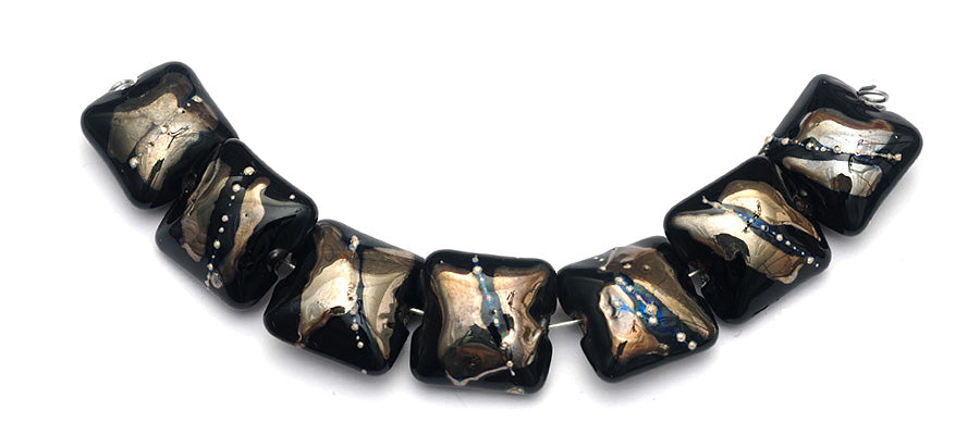 10204104 - Seven Elegant Black Metallic Pillow Beads