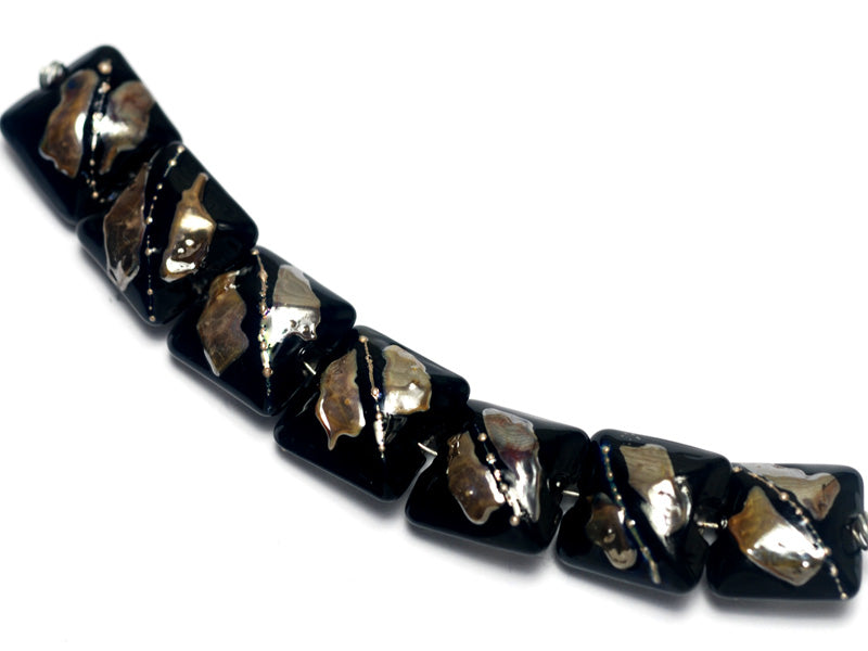 10204104 - Seven Elegant Black Metallic Pillow Beads