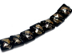 10204104 - Seven Elegant Black Metallic Pillow Beads