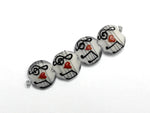 10205612 - Four Musical Love Notes Lentil Beads
