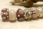 10301701 - Seven Amethyst w/Light Ivory Rondelle Beads