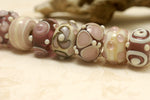 10301701 - Seven Amethyst w/Light Ivory Rondelle Beads