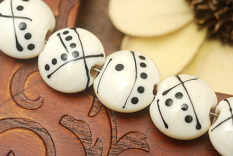 10303002 - Seven Ivory w/Black Lentil Beads