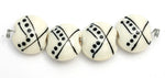 10303012 - Four Ivory w/Black Lentil Beads