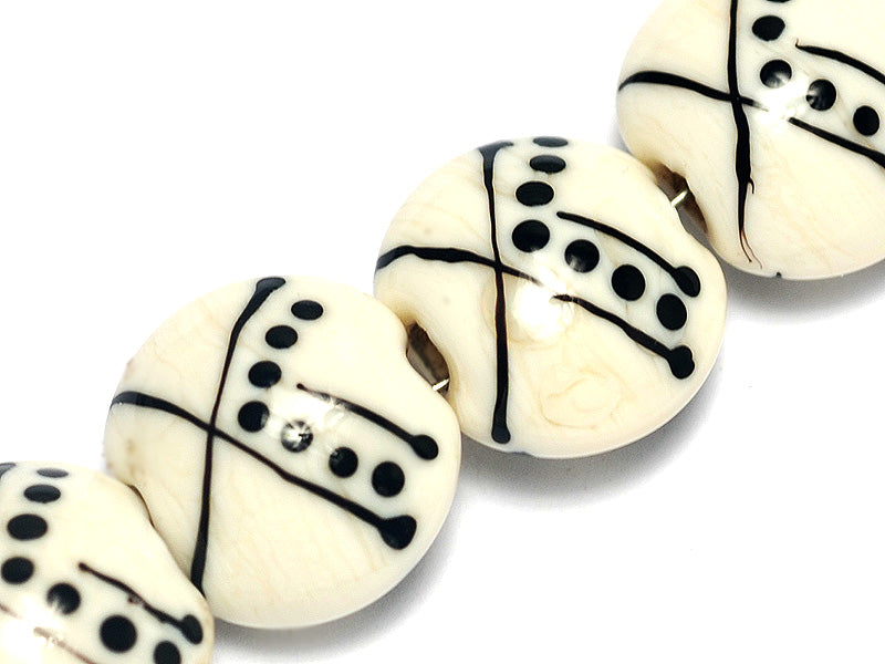 10303012 - Four Ivory w/Black Lentil Beads