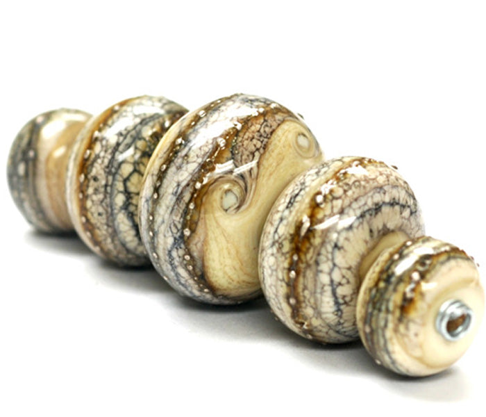 10306011 - Five Graduated Dark Ivory w/Silver Rondelle Beads