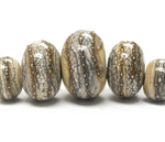 10306011 - Five Graduated Dark Ivory w/Silver Rondelle Beads