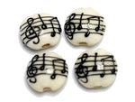 10306212 - Four Musical Notes Lentil Beads