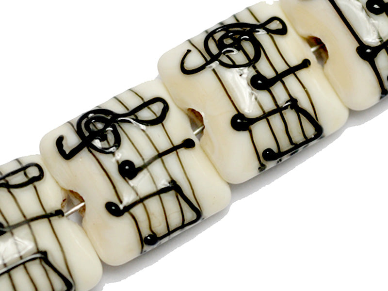 10306214 - Four Musical Notes Pillow Beads