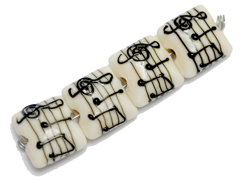 10306214 - Four Musical Notes Pillow Beads