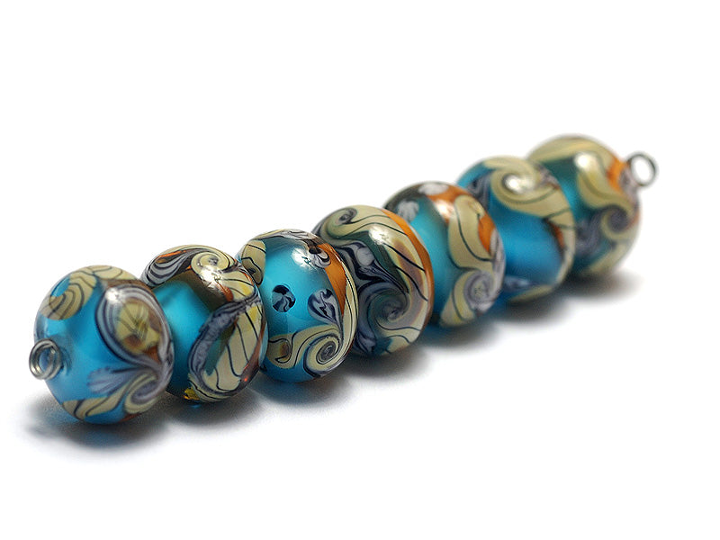 10405501 - Seven Amber Ocean Rondelle Beads