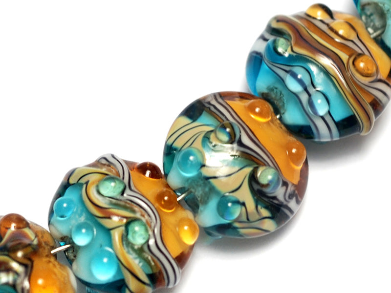 10405502 - Seven  Aqua w/Light Brown Lentil Beads