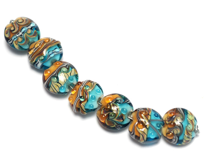 10405502 - Seven  Aqua w/Light Brown Lentil Beads