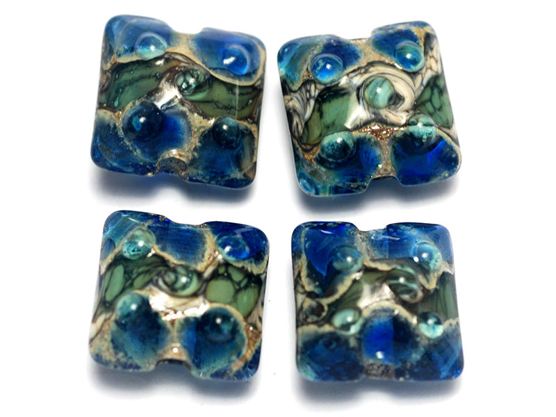 10406514 - Four Deep Blue Ocean Pillow Beads