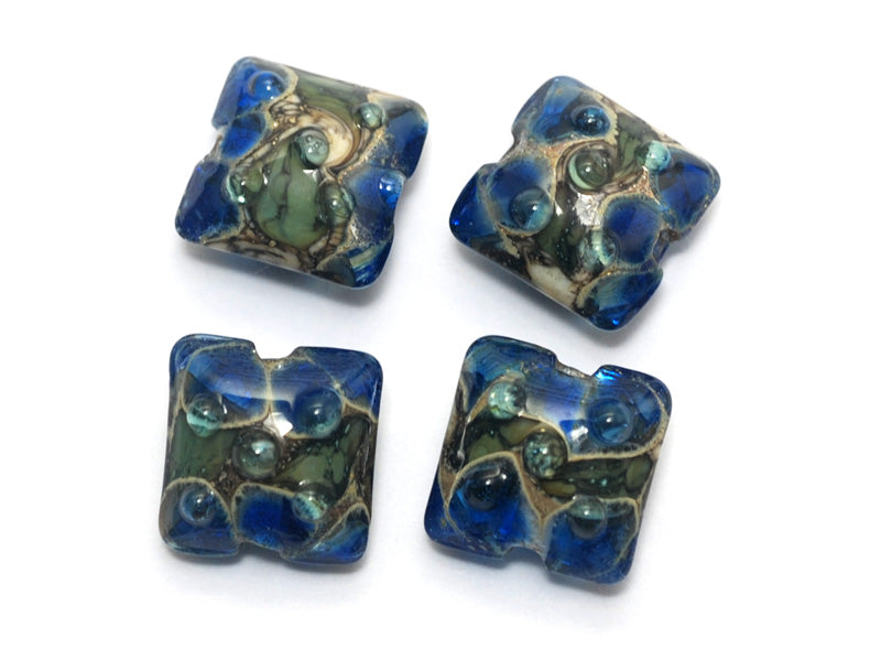 10406514 - Four Deep Blue Ocean Pillow Beads