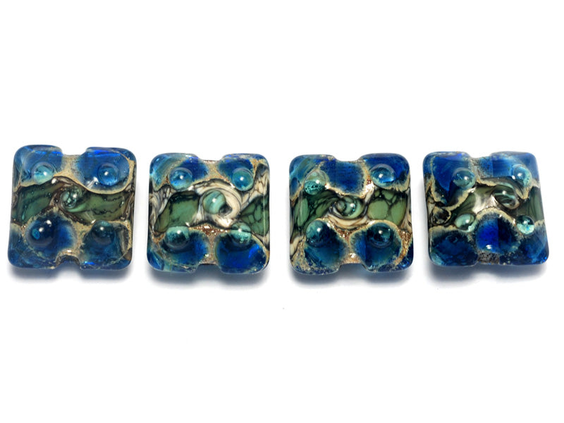 10406514 - Four Deep Blue Ocean Pillow Beads