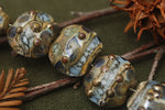 10406602 - Seven Gray Blue w/Silver Foil Lentil Beads