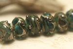 10406701 - Seven Ocean Blue w/Silver Foil Rondelle Beads