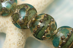 10406702 - Seven Ocean Blue w/Silver Foil Lentil Beads