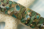 10406704 - Seven Ocean Blue w/Silver Foil Pillow Beads
