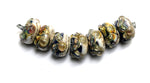 10407001 - Seven Transparent Ink Blue Free Style Rondelle Beads