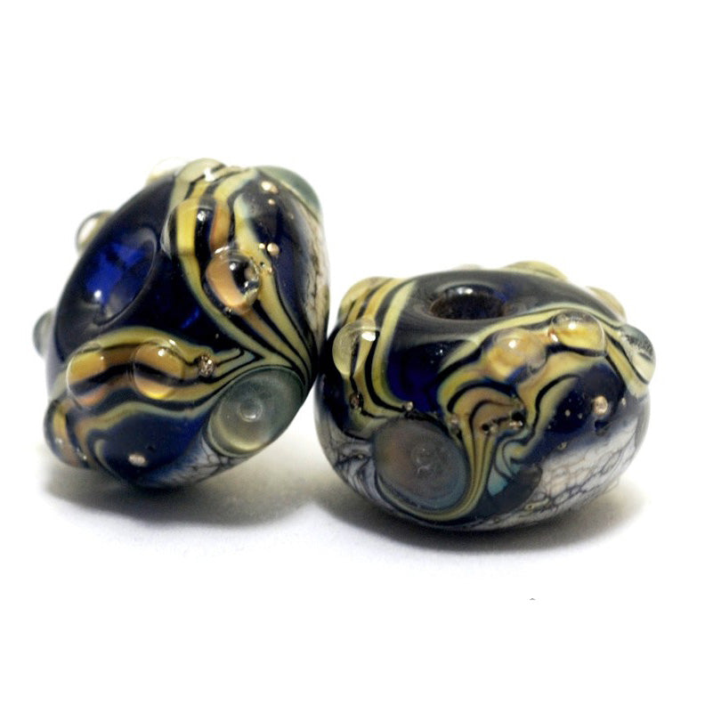 10407001 - Seven Transparent Purple Free Style Rondelle Beads