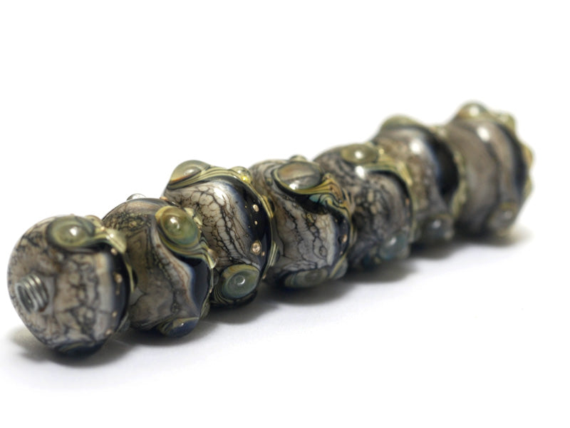 10407001 - Seven Transparent Ink Blue Free Style Rondelle Beads