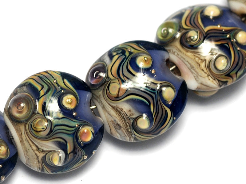 10407002 - Seven Transparent Ink Blue w/Free Style Lentil Beads
