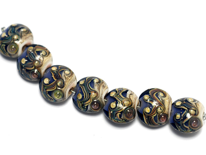 10407002 - Seven Transparent Ink Blue w/Free Style Lentil Beads
