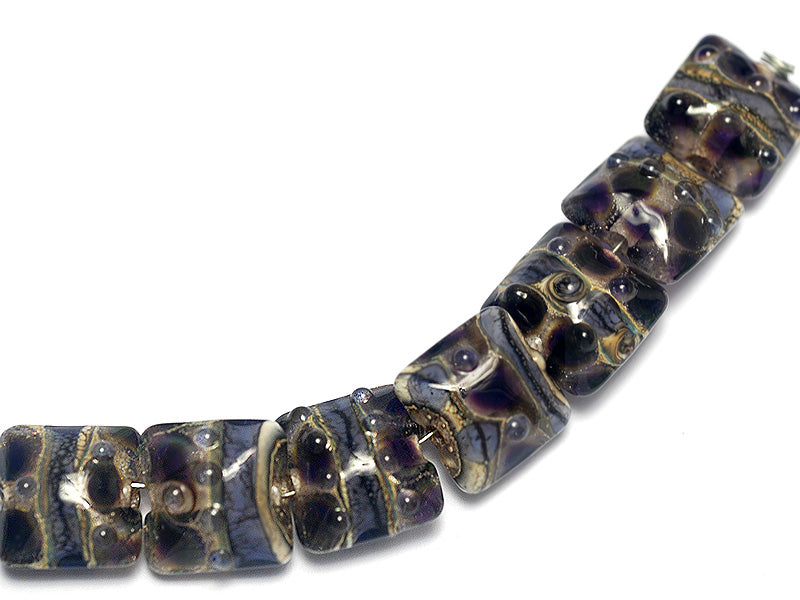 10407304 - Seven Black w/Purple Silver Foil Pillow Beads
