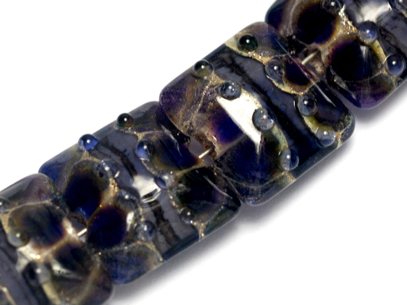 10407314 - Four Black w/Ink Blue Silver Foil Pillow Beads